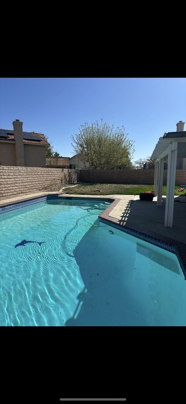 1761 W Blackberry Ct, Palmdale, CA 93551 - view of swimming pool with a fenced backyard and a patio area