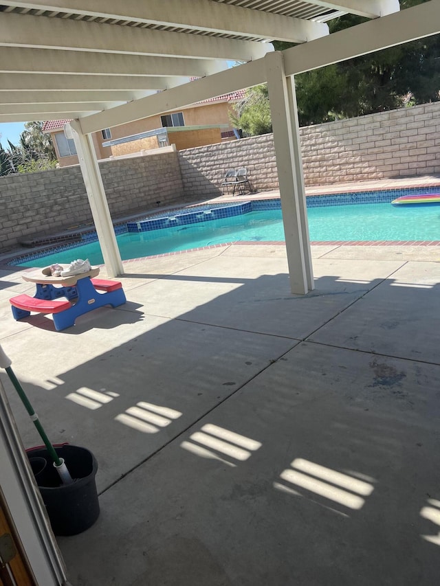 1761 W Blackberry Ct, Palmdale, CA 93551 - view of pool featuring a fenced backyard, a pergola, and a patio