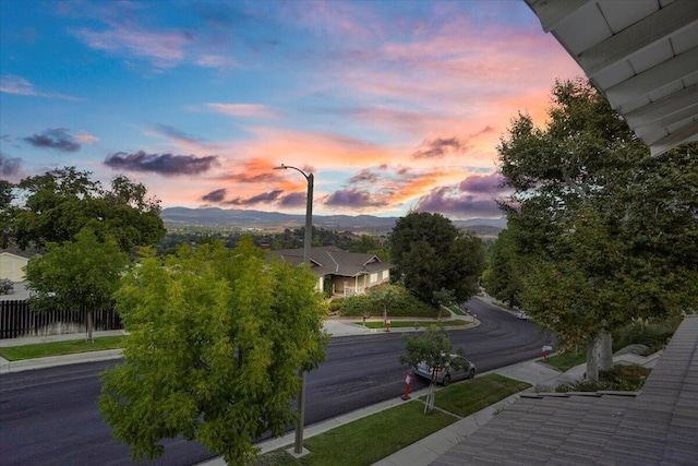 view of community with a mountain view