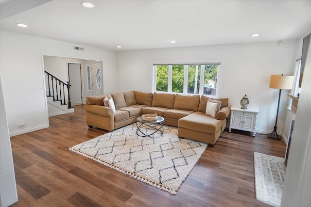 living room with dark wood-type flooring