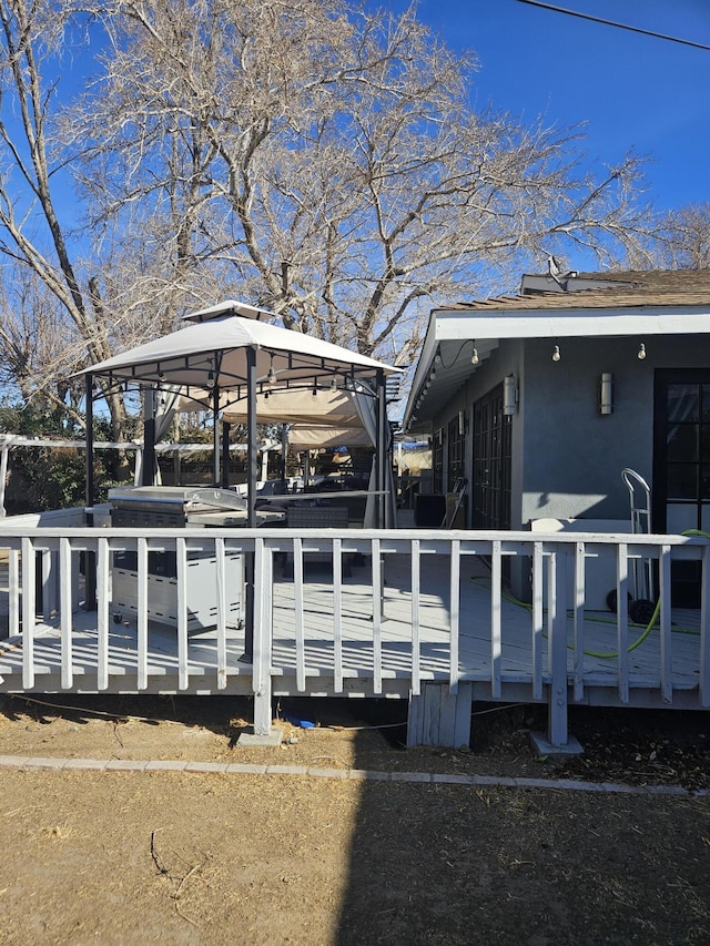 view of dock with a wooden deck