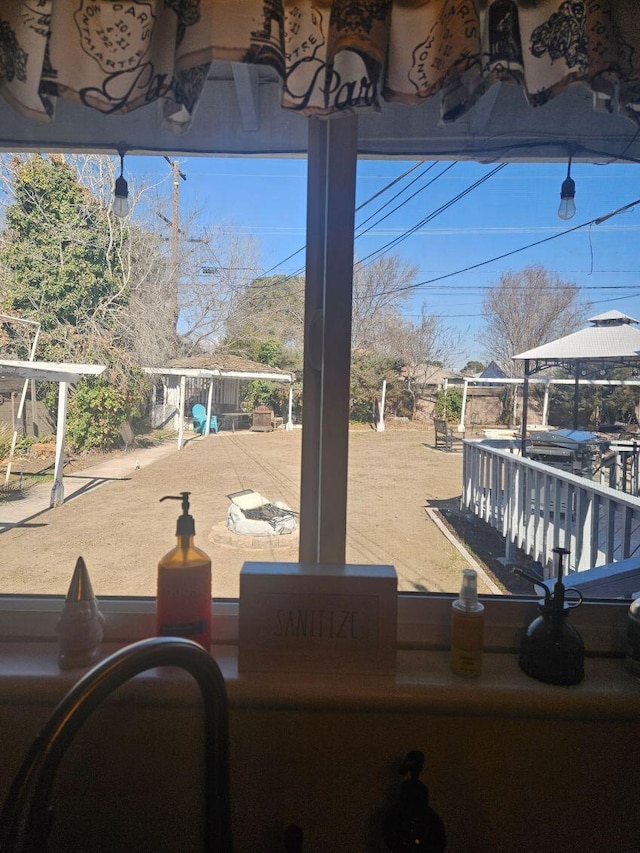wooden deck featuring a gazebo