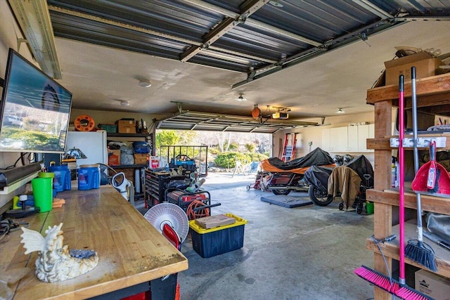 garage featuring a garage door opener