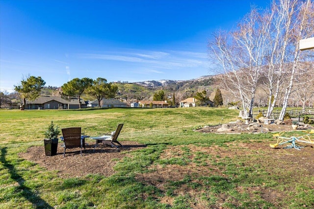 view of yard with a mountain view