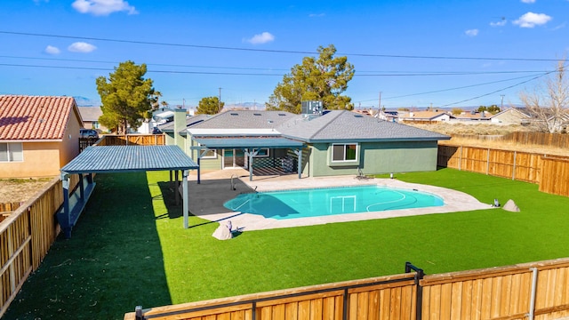 view of pool featuring a fenced in pool, a yard, a fenced backyard, central AC, and a patio area