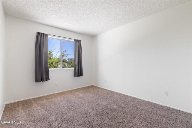 2130 Candice Ave, Rosamond, CA 93560 - empty room featuring carpet flooring and a textured ceiling
