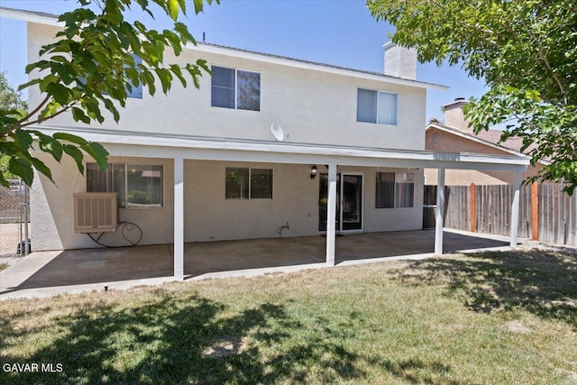 2130 Candice Ave, Rosamond, CA 93560 - rear view of property featuring a chimney, stucco siding, and a patio