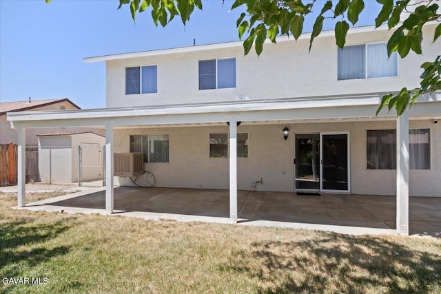 2130 Candice Ave, Rosamond, CA 93560 - back of property featuring stucco siding and a patio area