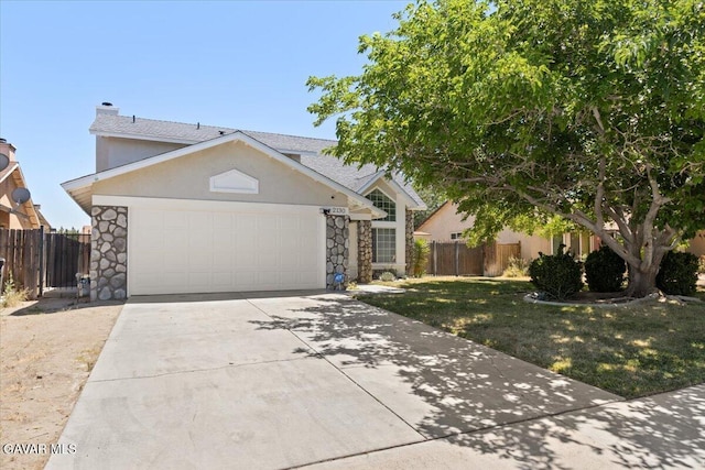 2130 Candice Ave, Rosamond, CA 93560 - view of front of property with stone siding, an attached garage, concrete driveway, a chimney, and stucco siding