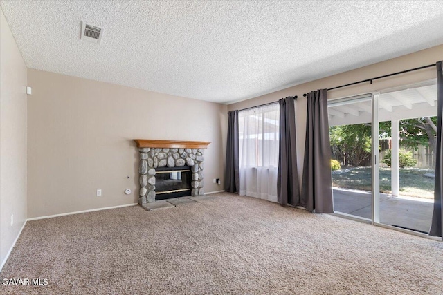 2130 Candice Ave, Rosamond, CA 93560 - unfurnished living room featuring a textured ceiling, carpet floors, and a fireplace