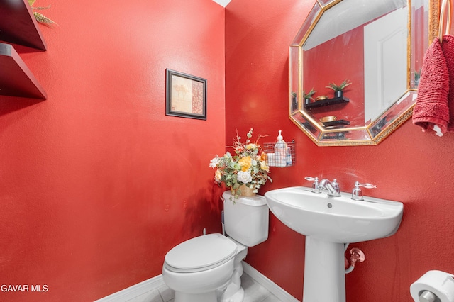 41507 Alexo Dr, Lancaster, CA 93536 - half bathroom featuring toilet and tile patterned flooring