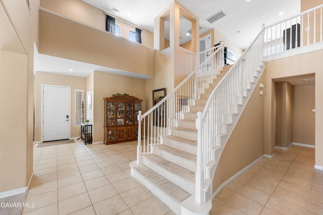 41507 Alexo Dr, Lancaster, CA 93536 - tiled foyer with a high ceiling and stairs
