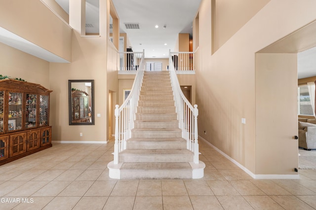 41507 Alexo Dr, Lancaster, CA 93536 - stairs with tile patterned floors and a towering ceiling