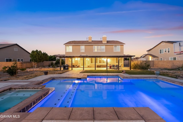 41507 Alexo Dr, Lancaster, CA 93536 - view of swimming pool with an in-ground hot tub, an outdoor hangout area, a fenced backyard, and a patio area