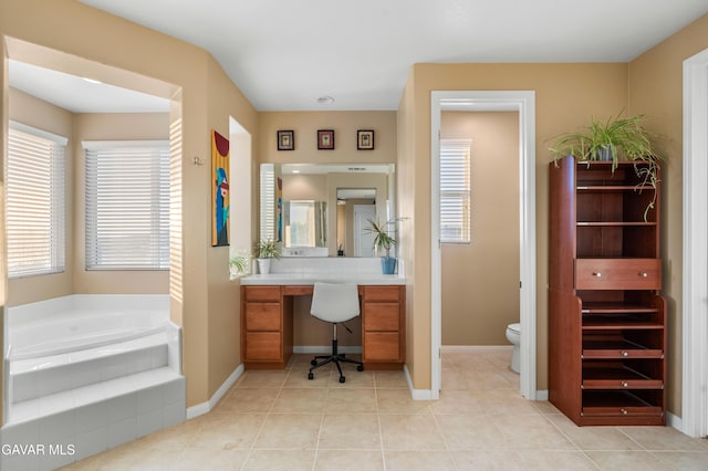 41507 Alexo Dr, Lancaster, CA 93536 - bathroom featuring a garden tub, vanity, and tile patterned flooring
