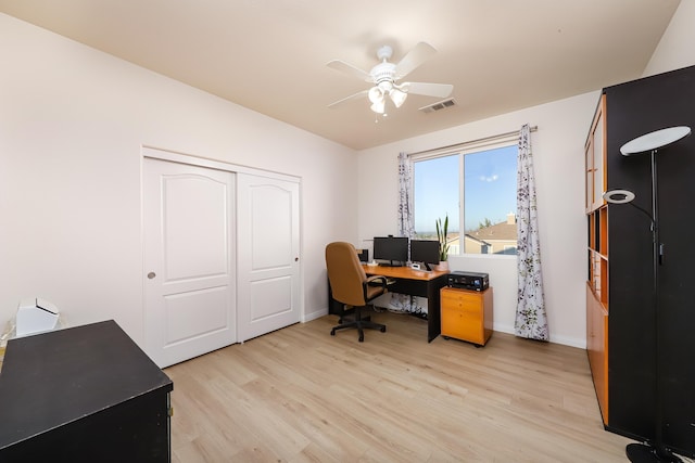 office area featuring light hardwood / wood-style flooring and ceiling fan