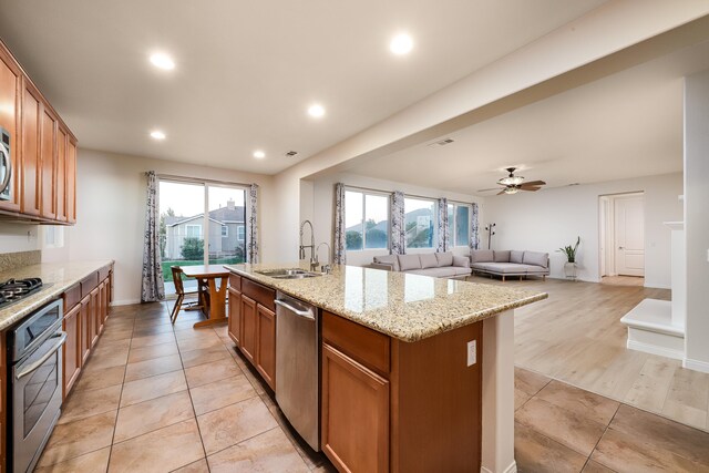 dining room with light hardwood / wood-style floors, a high ceiling, and a notable chandelier