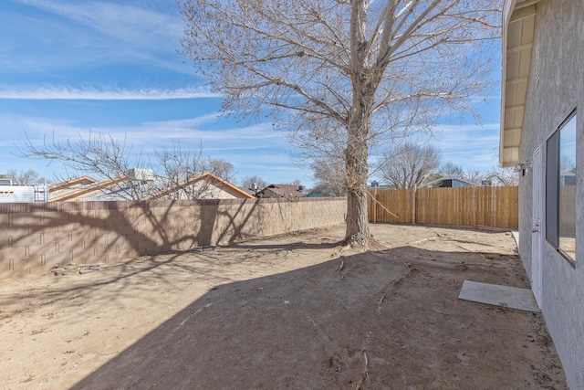 view of yard featuring a fenced backyard