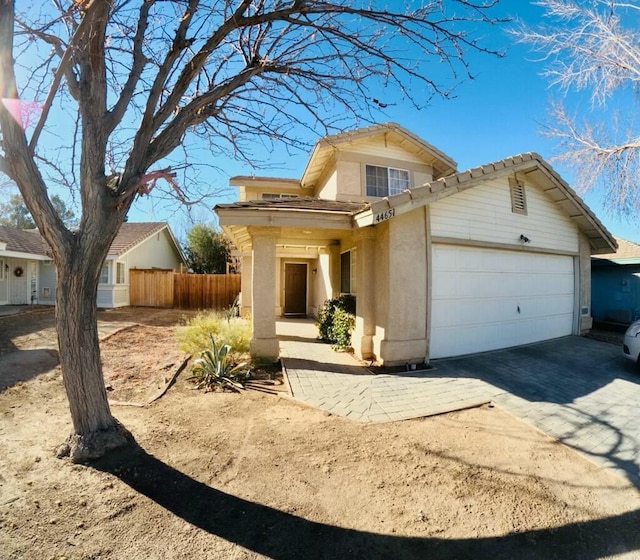 view of front of home featuring a garage