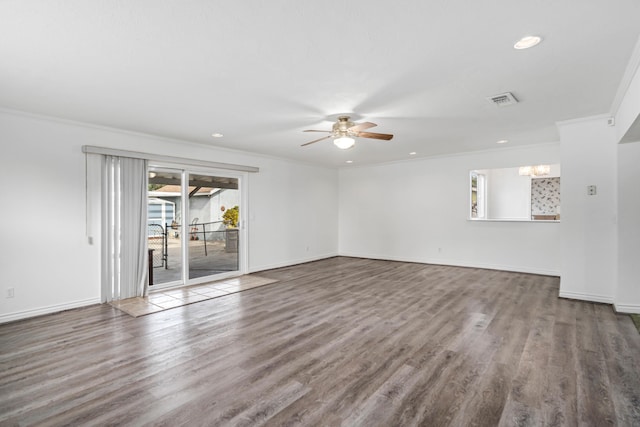 unfurnished room with hardwood / wood-style flooring, crown molding, and ceiling fan