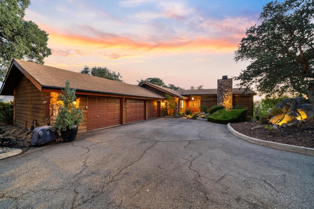 view of front of home with a garage