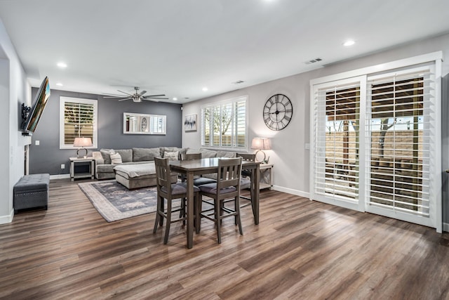 dining room featuring visible vents, baseboards, dark wood finished floors, recessed lighting, and a ceiling fan