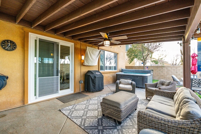 view of patio / terrace featuring fence, grilling area, an outdoor hangout area, ceiling fan, and a hot tub