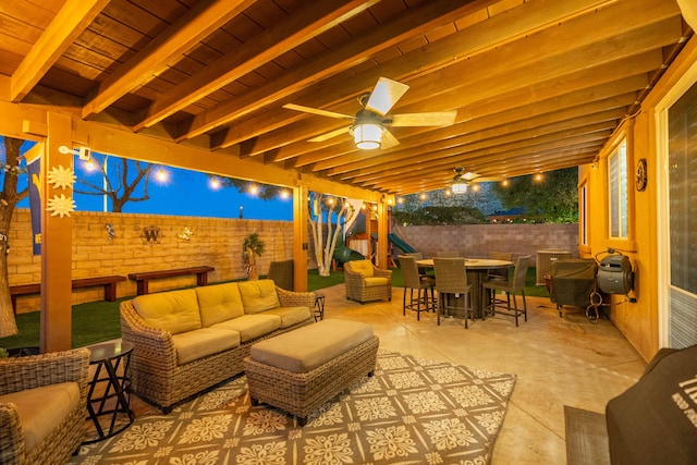 view of patio / terrace with grilling area, a playground, outdoor lounge area, a fenced backyard, and outdoor dining space