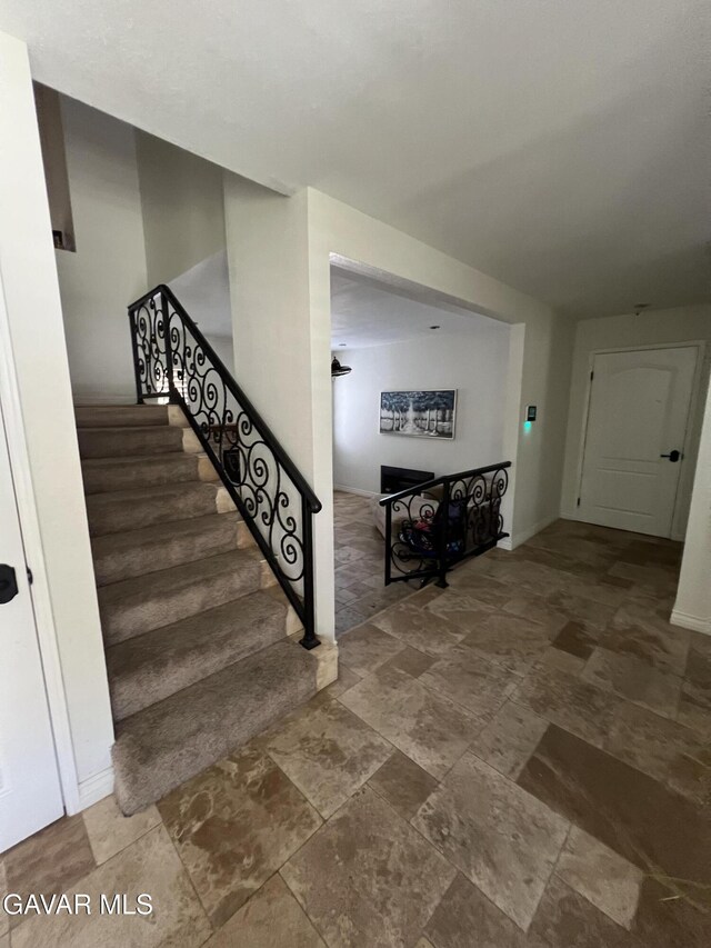 6001 Brougham St, Lancaster, CA 93536 - stairs featuring stone finish flooring