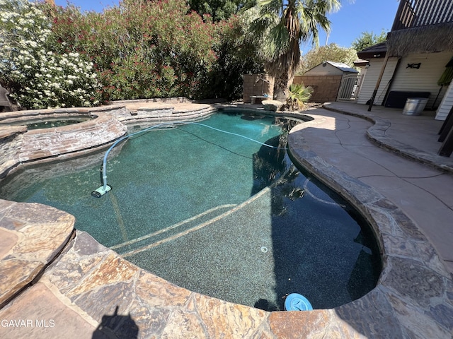 6001 Brougham St, Lancaster, CA 93536 - view of swimming pool featuring an in-ground hot tub and a patio area