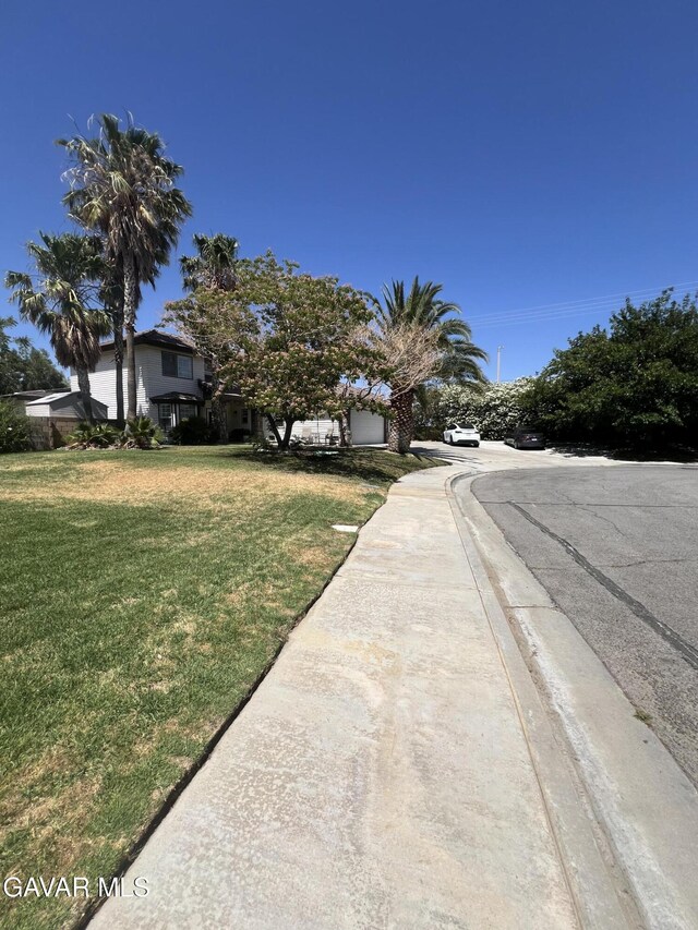 6001 Brougham St, Lancaster, CA 93536 - view of front of house with a front yard