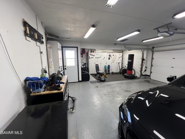 6001 Brougham St, Lancaster, CA 93536 - garage with a garage door opener