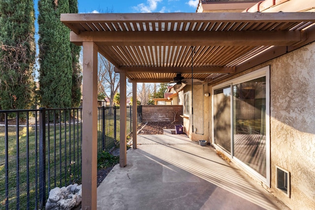 view of patio with ceiling fan and a pergola