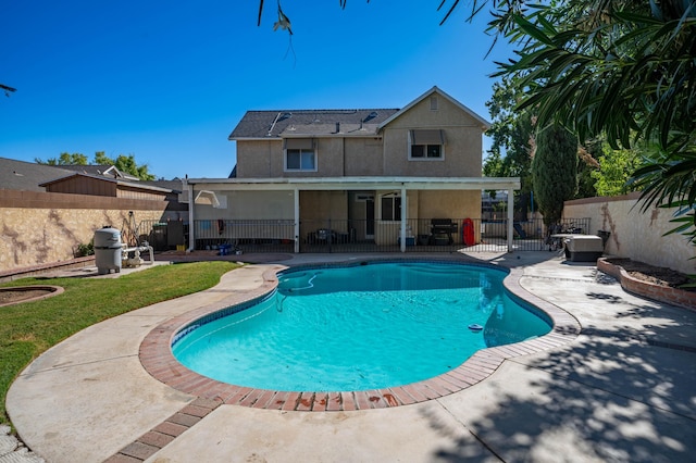 view of pool featuring a patio area