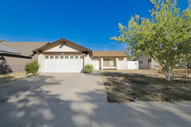 ranch-style home with a garage