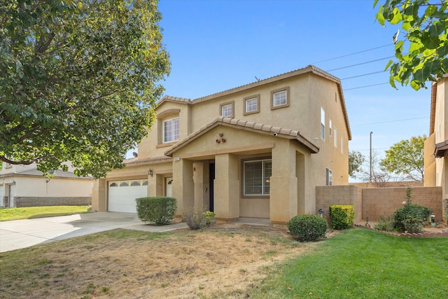 mediterranean / spanish-style home featuring a front yard and a garage