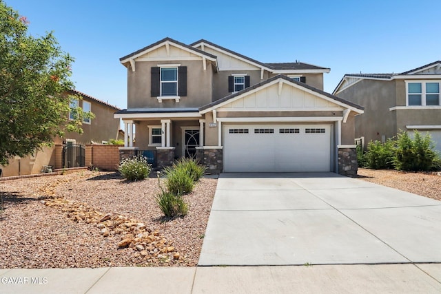 37522 Citron Pl, Palmdale, CA 93551 - craftsman-style house with board and batten siding, covered porch, driveway, a garage, and stone siding