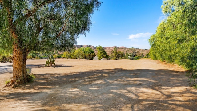 exterior space featuring a mountain view