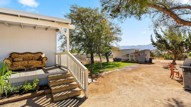 view of yard with a mountain view