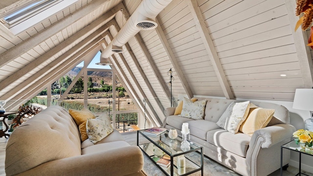 living room with vaulted ceiling with beams, a mountain view, and wood ceiling