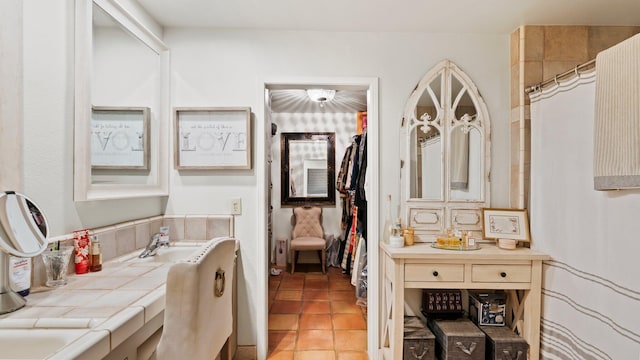 bathroom featuring tile patterned floors and sink