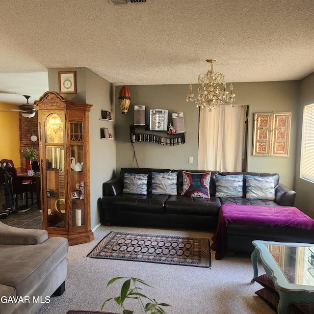 42902 Sachs Dr, Lancaster, CA 93536 - living area featuring carpet floors, a chandelier, a textured ceiling, and ceiling fan