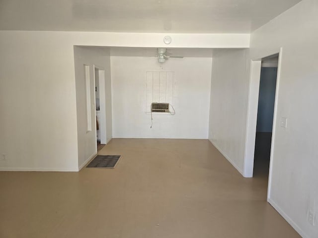 empty room featuring ceiling fan