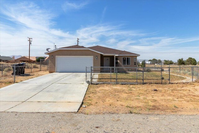 single story home featuring a garage