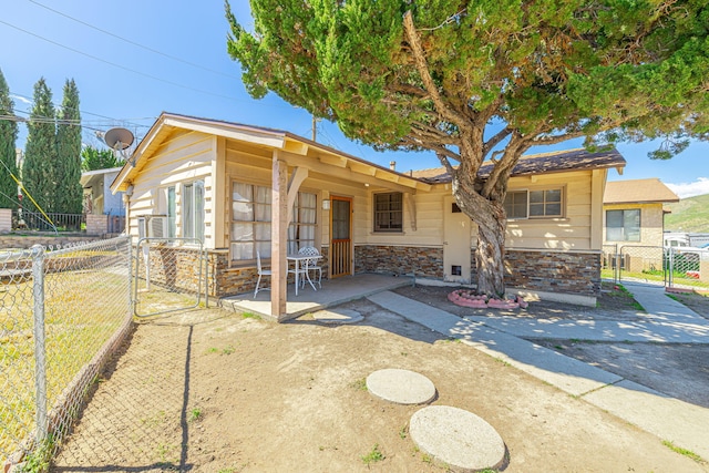 view of front of property featuring a patio area