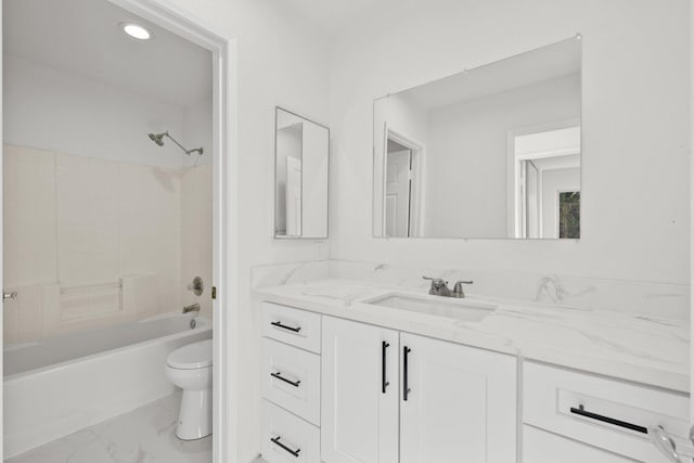 full bath with vanity,  shower combination, marble finish floor, and toilet
