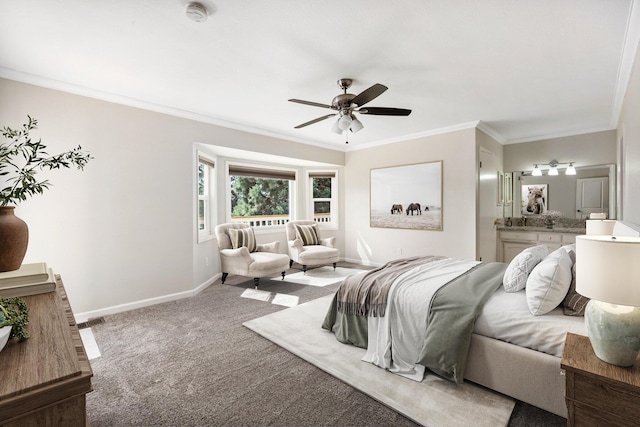 carpeted bedroom with ensuite bath, ornamental molding, and ceiling fan