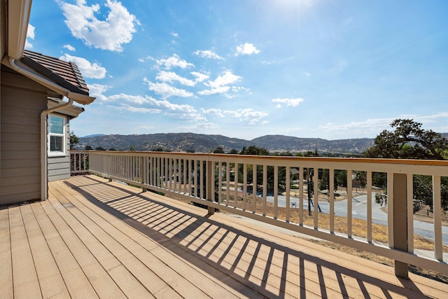 wooden terrace featuring a mountain view