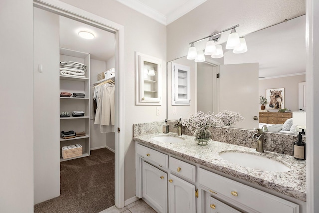 bathroom with vanity and ornamental molding