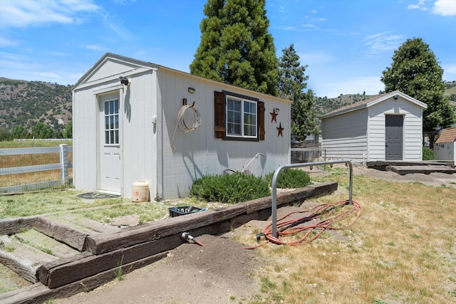 view of front of home featuring a mountain view